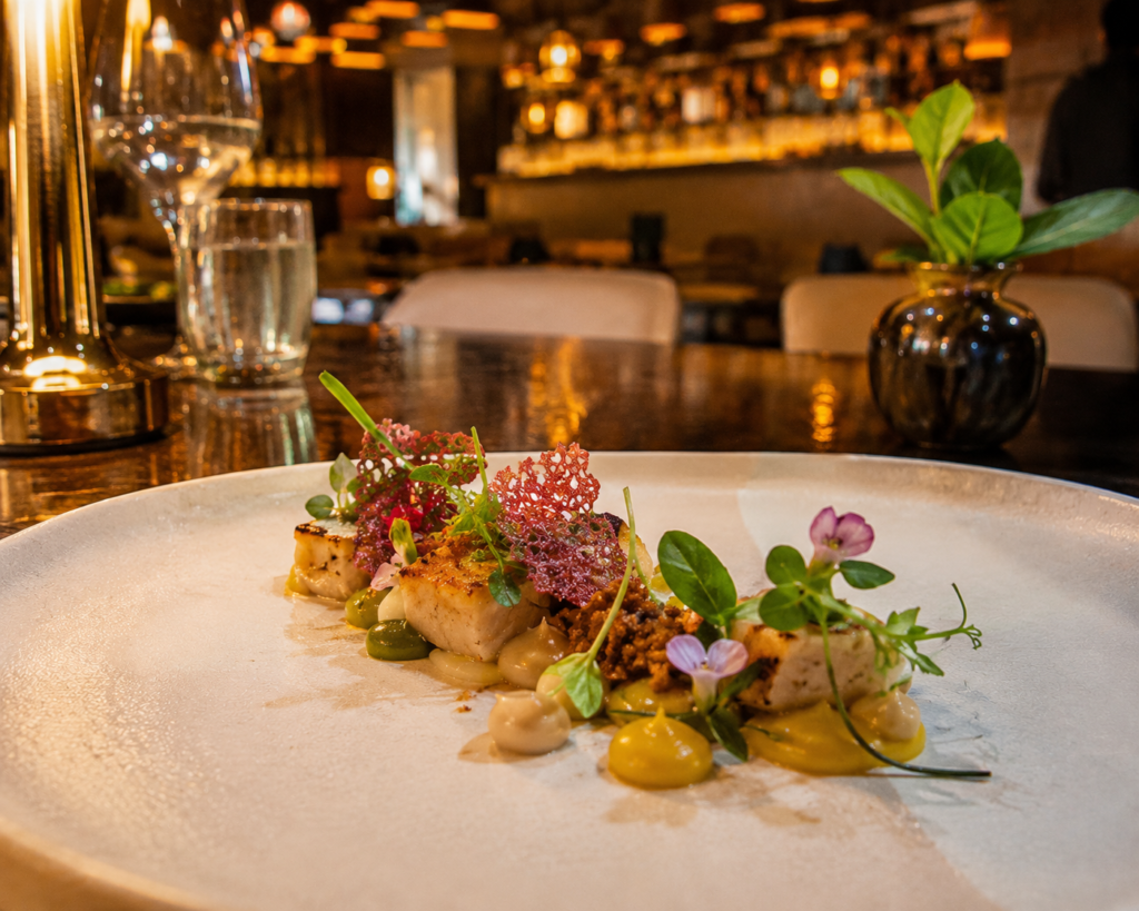 A plated dish at Indian Accent fine dine restaurant— India Food guide 2026 - all the cities popular street food, fine dinning meals, food tours,drinks & desserts.