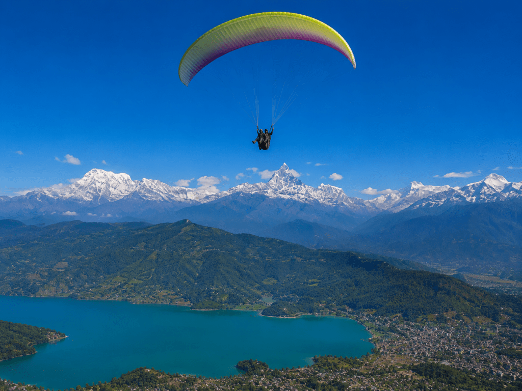 Tandem paraglider above Pokhara  - Complete Nepal Travel Guide 2026