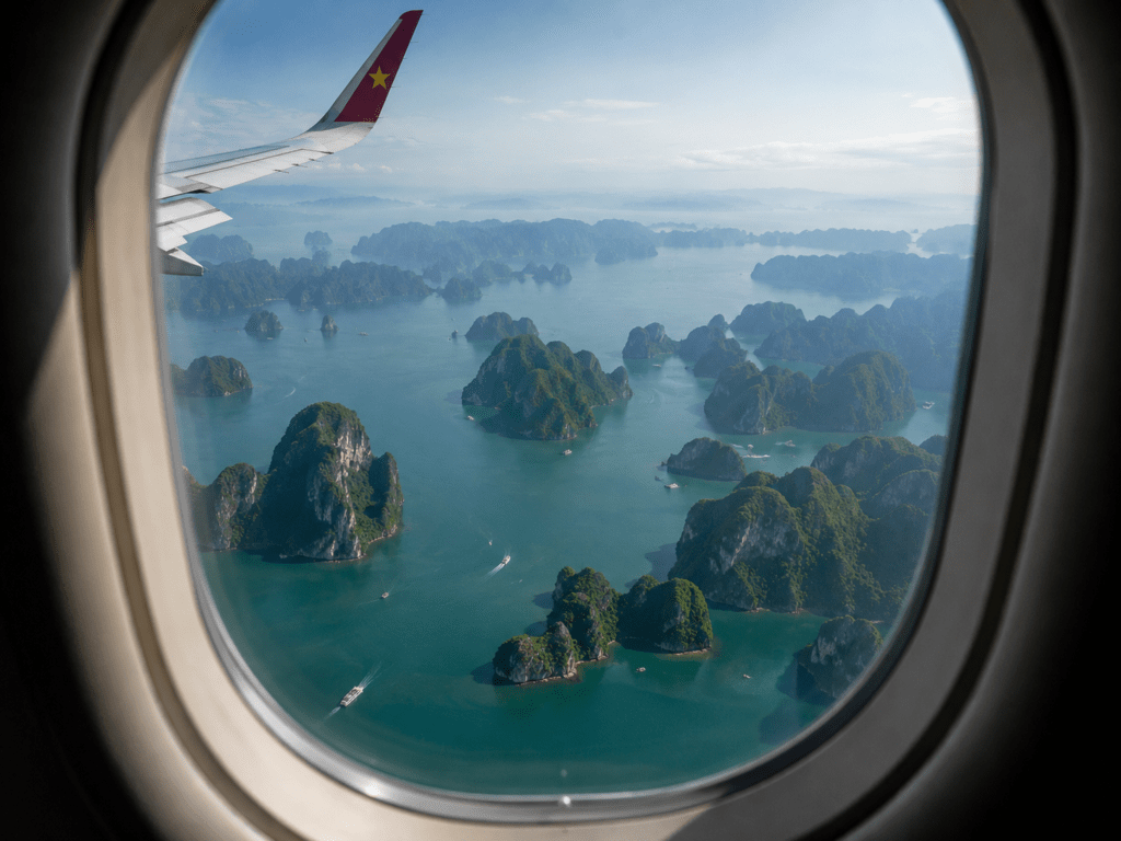 Aerial view of Ha Long Bay limestone islands from a flight