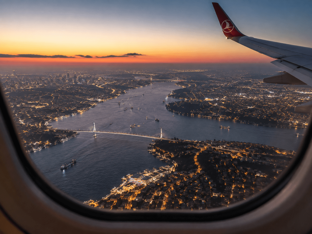 Aerial view of the Bosphorus and Istanbul skyline from a flight window